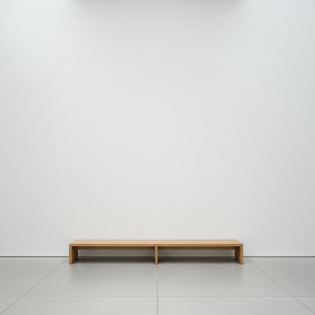 Wall art mockup: Minimalist gallery with white walls and a wooden bench