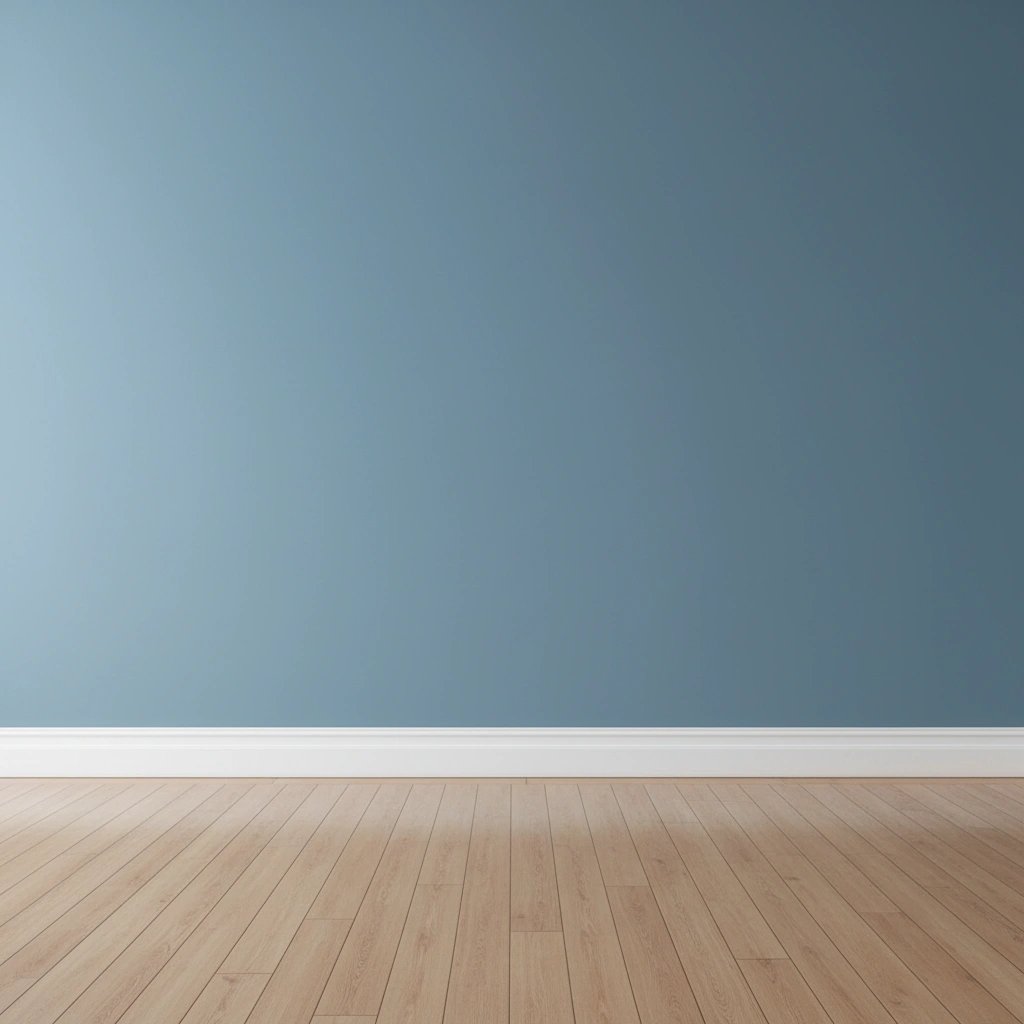 Wall art mockup: Minimalist gallery with a blue wall and wooden floor