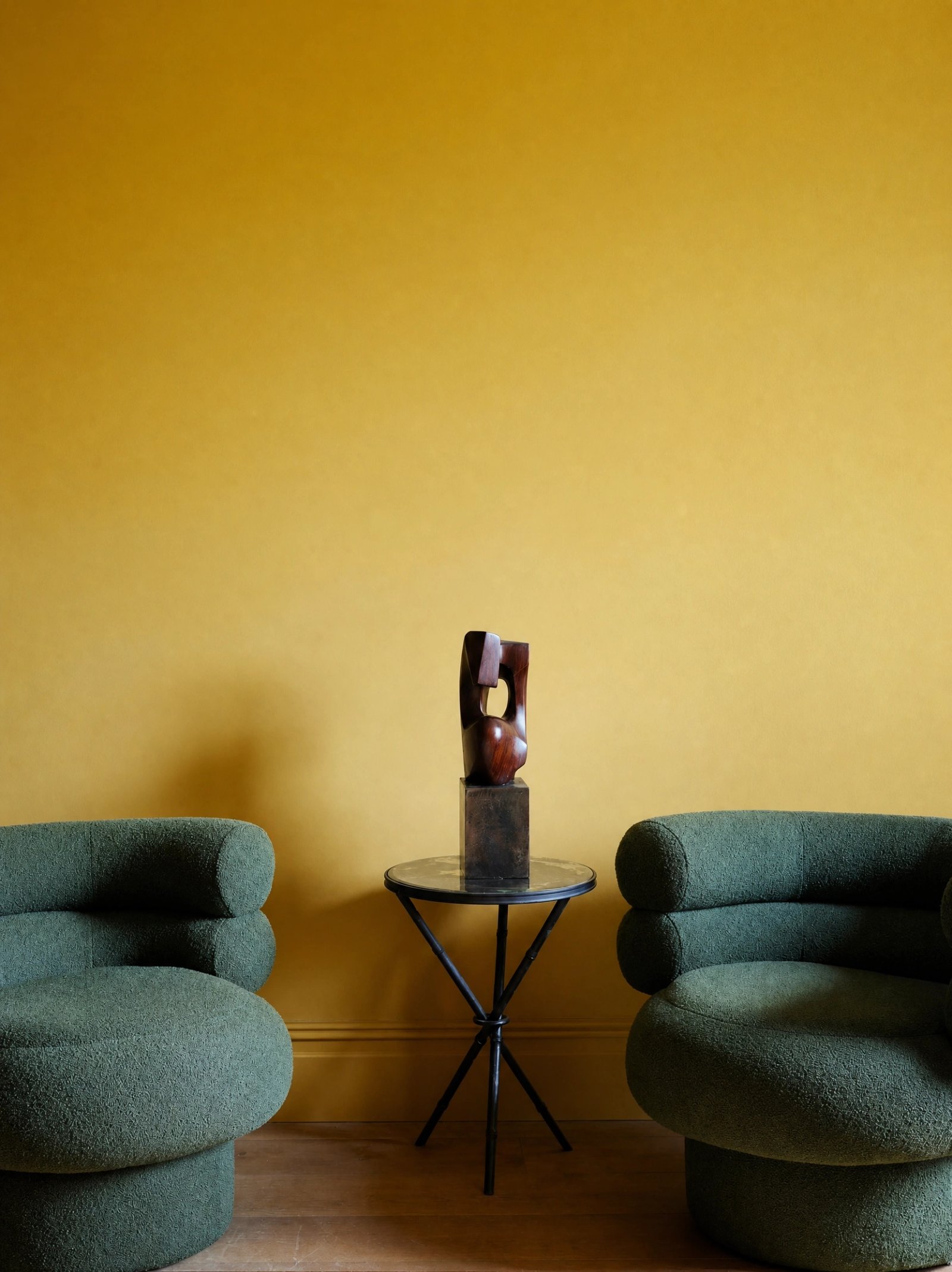 Wall art mockup: Eclectic living room with yellow walls and armchairs