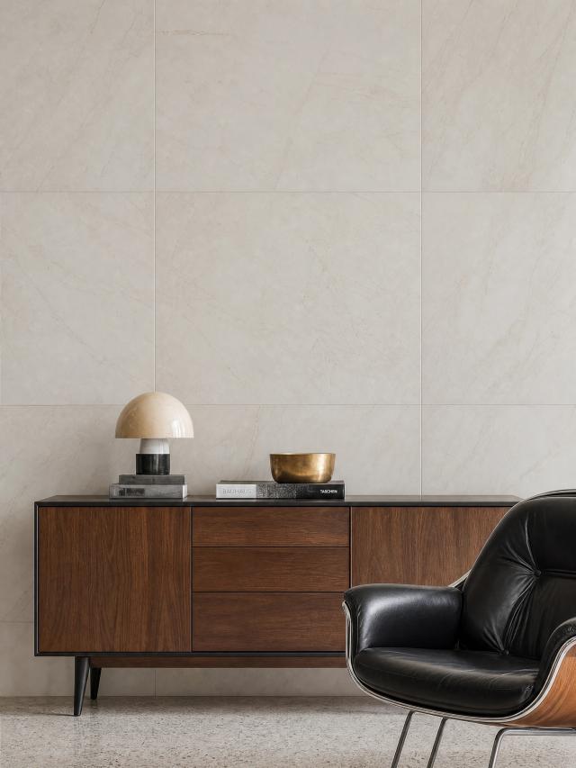 Contemporary room with a tiled wall and dark wood cabinetry