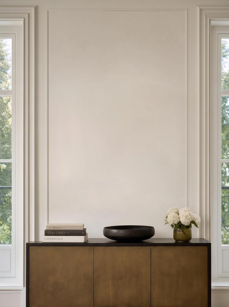 Grand hallway with panelled walls and a console table