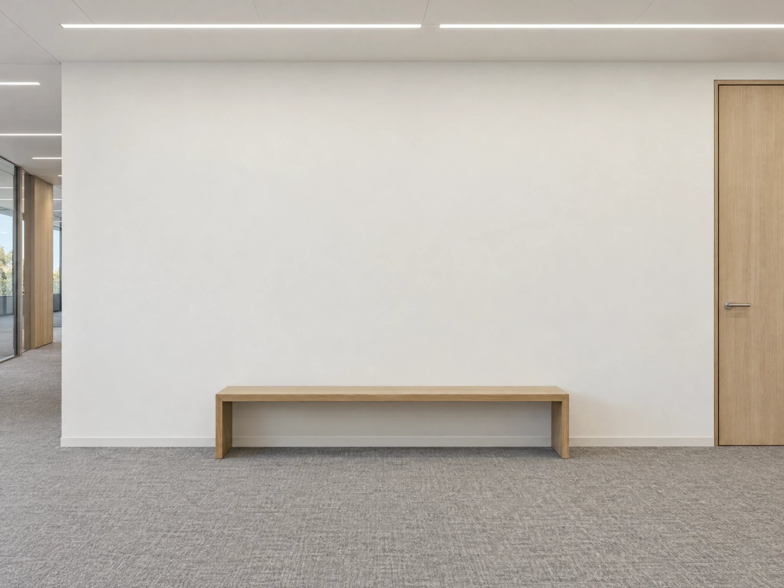 Wall art mockup: Contemporary lobby with a white wall and wooden bench